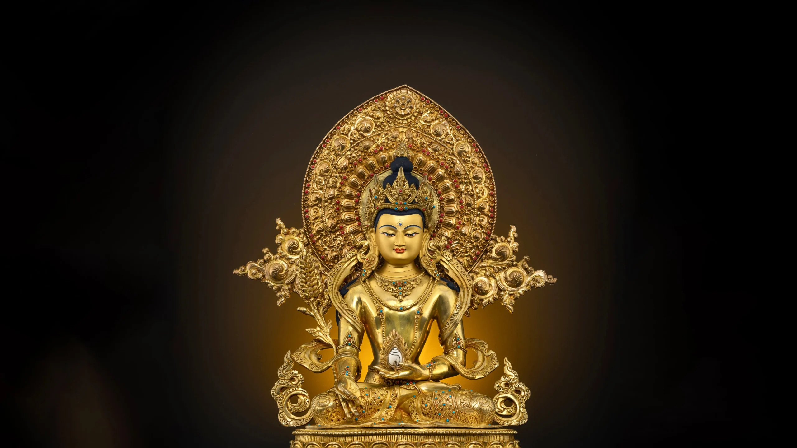 Kṣitigarbha Bodhisattva statue with halo and jewel in hand