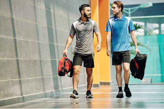 Person walking into Gym Lumolog highlighting commitment to fitness 